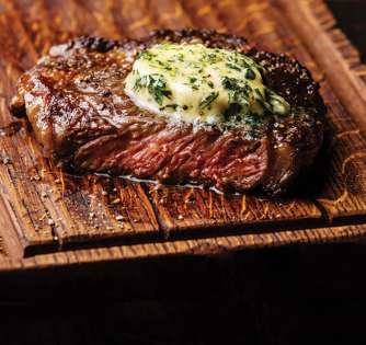 Succulent Ribeye With Herb Butter | Mercato